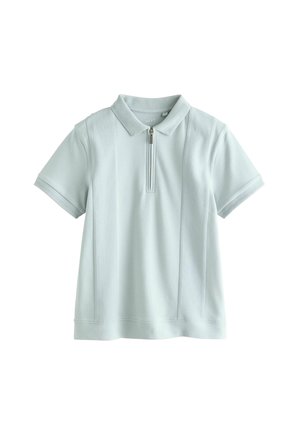 Lyseblå polo-shirt med lynlåslukning ved kraven, korte ærmer, teksturerede paneler på siderne og en glat stoffinish.