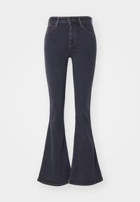 Jeans de tiro alto en denim oscuro, con textura suave, cierre de cremallera y botón, y un pronunciado acampanado en el dobladillo.