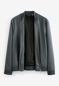 Veste bomber gris foncé avec col, poignets et ourlet côtelés, deux poches latérales et fermeture éclair argentée, montrée ouverte pour révéler la doublure intérieure noire.