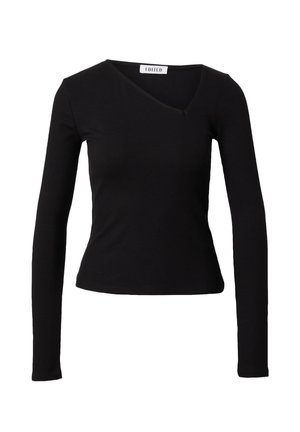 Zwarte top met lange mouwen, ribbelstructuur en een V-halsontwerp. De pasvorm is slim, met een iets verkorte lengte en minimale afwerking.