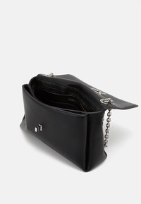 Black leather shoulder bag with a textured finish, silver hardware, and a chain strap. Features a spacious interior with multiple compartments.