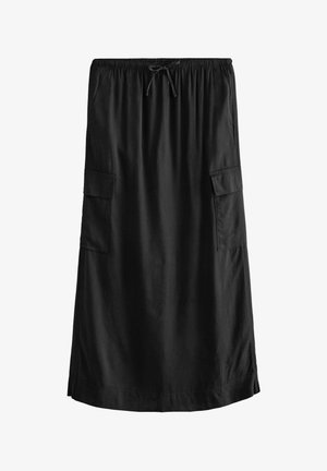 Mustade põlvepikkune seelik pehmest kangast, millel on elastne vöökoht ja nööri sulgemine ning kaks külgtaskut.