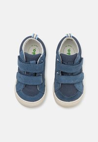 Blue toddler sneakers made of mesh and suede, featuring two Velcro straps, a soft lining, and a white rubber sole.