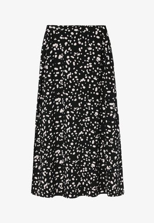 Črna krilo z ohlapnim krojem, ki ima pikčasto motiv v različni odtenkih bele. Narejeno iz lahkega blaga z gladko teksturo.