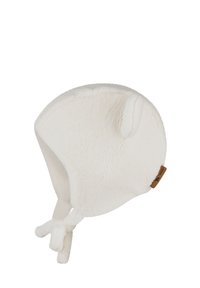 White fleece hat with rounded top, ear flaps, and knot ties. Features small ear-like accents and a leather brand tag on the side.