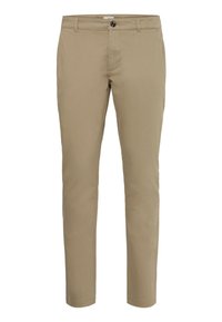 Pantalon chino beige à coupe slim. Confectionné en tissu mélangé coton. Présente une fermeture à boutons et des poches standards. Texture lisse avec peu de détails.