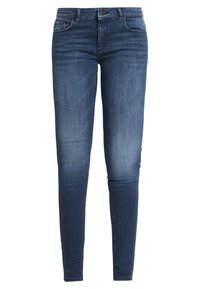 Vaqueros ajustados de tiro medio en denim azul oscuro, con un ligero desgaste, diseño de cinco bolsillos, cremallera y cierre de botón metálico.