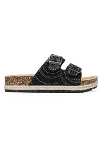 Sandales à glissière noires ornées de perles avec deux boucles réglables, base en liège et un détail en corde tressée le long du bord. Design texturé et décontracté.