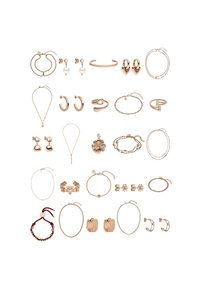 Collection of rose gold jewelry including necklaces, bracelets, earrings, and rings, featuring varied shapes, textures, and designs.