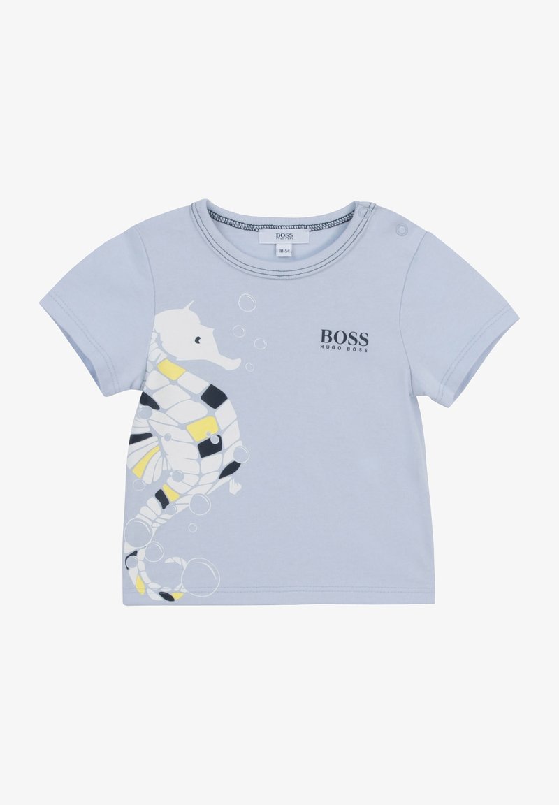 Světle modré tričko s krátkým rukávem vyrobené z bavlny, zdobené grafikou mořského koníka a bublin, s akcentními barvami žlutou a černou.