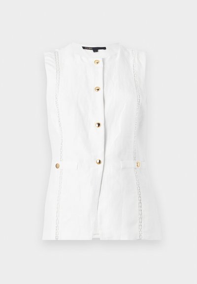 Gilet blanc sans manches avec des boutons dorés sur le devant et une bordure verticale en dentelle décorative des deux côtés.