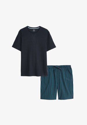Marineblauwe T-shirt met korte mouwen en een textuur, gecombineerd met teal-kleurige shorts met verticale strepen en een kleine strik aan de voorkant.