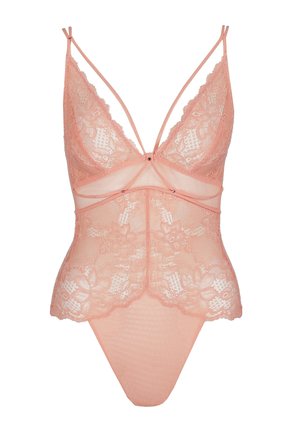 Perzikkleurige kanten body met een diepe V-hals, doorschijnende stof, verstelbare bandjes en bloemmotieven met gegolfde randen.