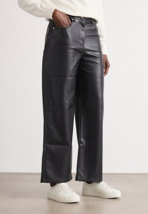 Auduma bikses - black