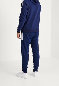 adidas Originals Teplákové kalhoty - dark blue