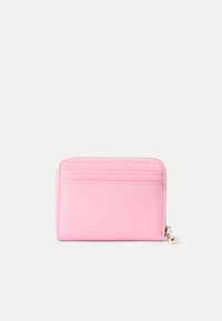 Pink leather wallet with a smooth texture, featuring multiple card slots, a zippered compartment, and embossed logo detail.