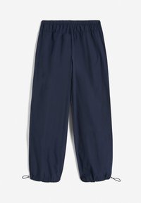 Pantaloni leggeri blu navy con vita elastica e polsini regolabili con cordino. Texture liscia, vestibilità ampia e senza motivi visibili.