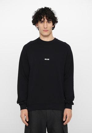 Sweatshirt noir à manches longues et ourlet côtelé, arborant le logo blanc "MSGM" sur la poitrine. Fabriqué en doux mélange de coton.