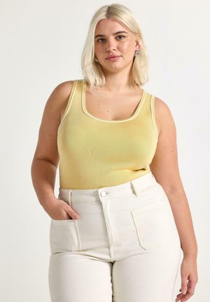Top - light dusty yellow