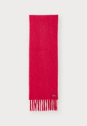 Sciarpa di lana rosa con estremità frangiate, caratterizzata da una superficie testurizzata e un piccolo logo su un lato. Design rettangolare, materiale morbido.