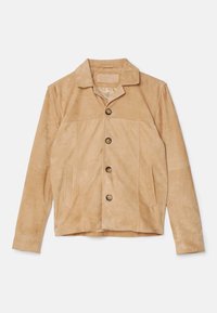 Veste en daim beige avec quatre boutons, deux poches latérales et un col, posée à plat sur un fond blanc.