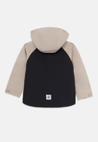 Children's hooded jacket with beige sleeves and hood, black back, and a small reflective square logo near the bottom center.