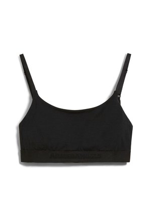 Bralette noire avec des bretelles réglables, fabriquée en tissu doux, présentant une large bande avec un texte en relief sur le bas.