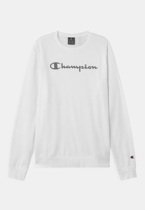 Biała bluza wykonana z bawełny, z szarym logo "Champion" na piersi oraz ściągaczami na rękawach i dole bluzy.