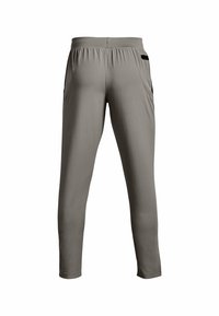 Ljust grå träningsbyxor med en figurnära design, elastiskt midjeband, sidofickor och slät textur, lämpliga för aktiv användning.