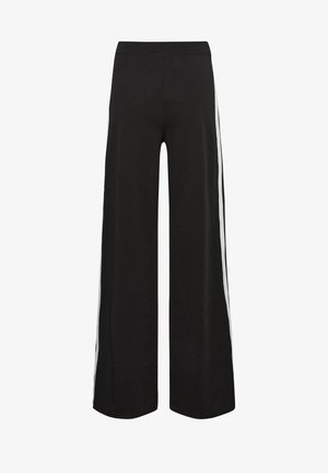 Mustat väljälahkeiset housut, joissa on rento istuvuus, pehmeä kangas ja valkoiset sivuraidat. Venytettävä vyötärö mukavuutta ja helppokäyttöisyyttä varten.