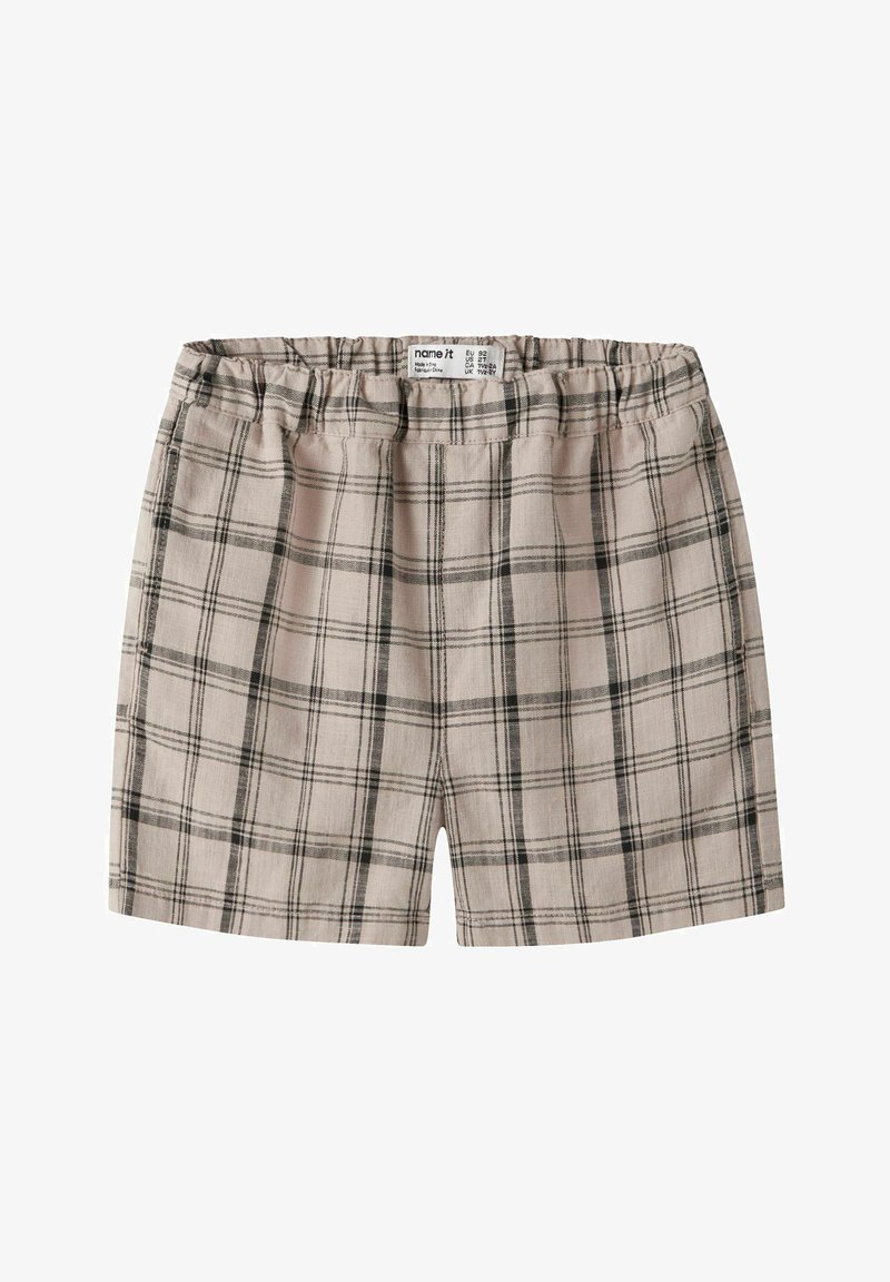 Short beige et noir à carreaux avec taille élastique et poches latérales, conçu pour les tout-petits ou les jeunes enfants.