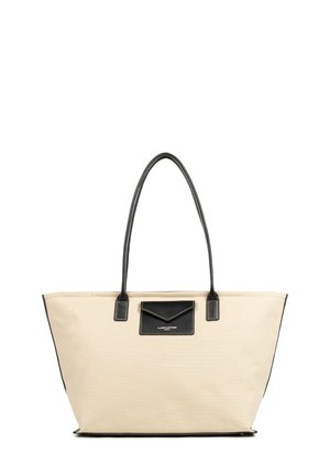 Borsa tote in tela beige con dettagli in pelle nera, base piatta e manici lunghi. Presenta una tasca nera con dettagli di cucitura sul davanti.