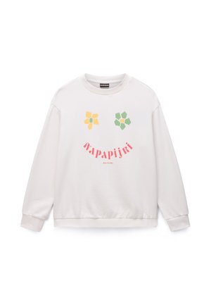 Felpa bianca con scollo rotondo, caratterizzata da stampe floreali gialle e verdi e dal nome del marchio "Napapijri" in rosa sulla parte anteriore.