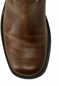 Brown leather shoe with a smooth surface and slight creasing. Rounded toe, black rubber sole, and subtle stitching detail near the top.