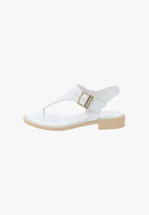 Sandale blanche avec un design à lanières, boucle ajustable, matériau supérieur lisse et semelle plate légère couleur beige. Possède une esthétique minimaliste.