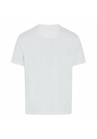 Biała koszulka z krótkim rękawem, okrągły dekolt, wykonana z miękkiego materiału, o prostym kroju i gładkiej, jednolitej fakturze.