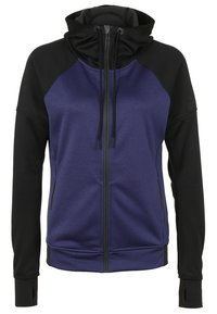 Veste à capuche zippée avec devant violet et manches, capuche et poignets noirs avec trous pour les pouces.