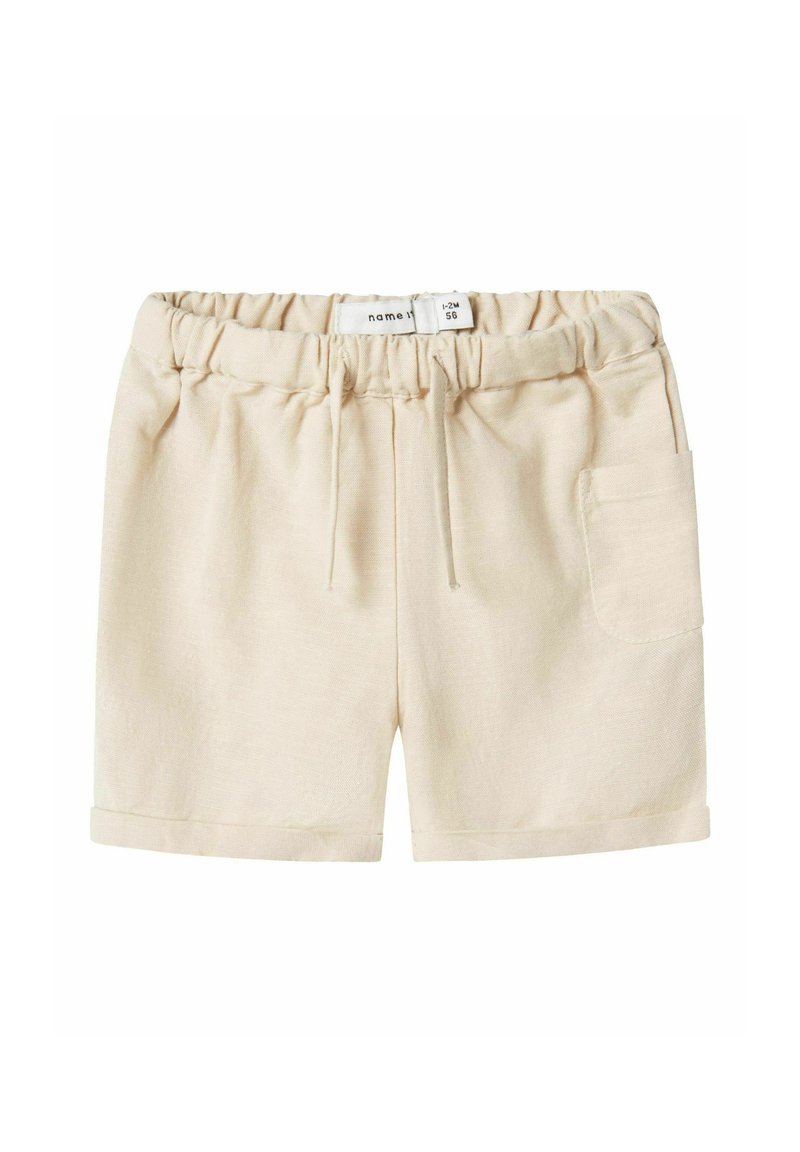 Beige shorts met een elastische tailleband, trekkoorddetail, opgerolde manchetten en een zijzak. Gemaakt van een zachte, lichte stof.