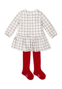 Robe à carreaux blanche, bleue et rouge avec des manches longues et un ourlet volan, associée à des collants en tricot rouges. Fermeture à boutons dans le dos.