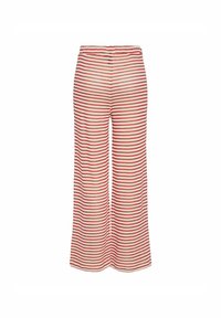 Pantalons larges rayés rouge et blanc avec une taille élastique, en tissu doux et texturé, offrant une coupe décontractée.
