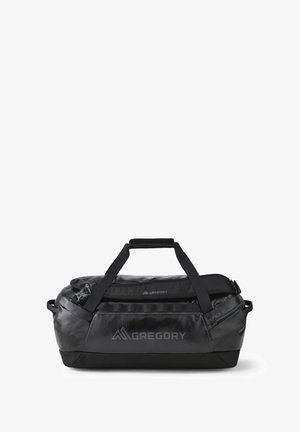Sac polochon noir à texture brillante, matériau durable, double poignée de transport supérieure, fermeture éclair et logo "Gregory" bien visible.