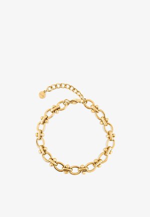 Náramek zlatého řetízku s oválnými články a malými kulatými korálky, vybavený karabinkovým zapínáním a nastavitelným prodlužovacím řetízkem.