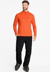 Ziener JELANO - Long sleeved top - orange pumpkin