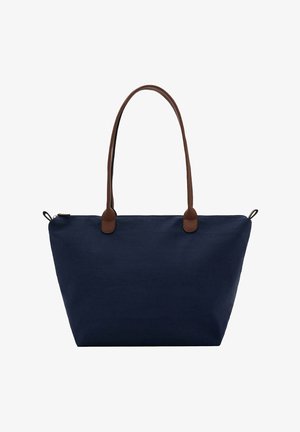 Grand sac cabas bleu marine avec une large base et des bretelles en cuir marron, avec une fermeture éclair en haut et des boucles latérales.