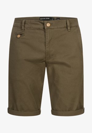 Khakifarbene Denim-Shorts mit umgeschlagenem Saum, ausgestattet mit einem Knopfverschluss und Seitentasche. Der Stoff hat eine glatte Textur und eine gedämpfte Farbe.