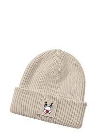 Knit beige beanie with ribbed texture, featuring a white patch with a reindeer face, red nose, and black antlers.