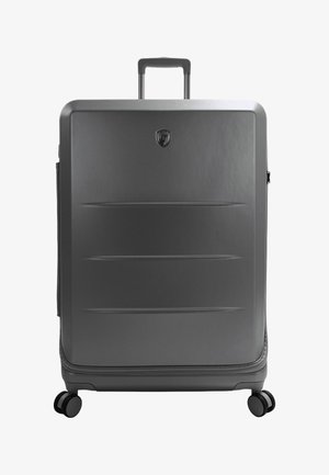 Hartschalenkoffer in mattem Grau mit strukturiertem Finish, einem ausziehbaren Griff und vier schwarzen Spinner-Rädern für einfache Mobilität.