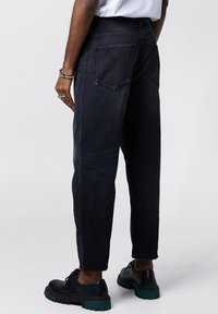 Tigha Jeans a sigaretta - dark grey