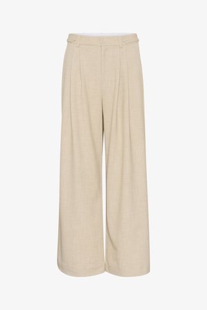Pantalons larges beiges en tissu texturé avec un design taille haute, comportant deux boutons à l'avant et deux poches latérales pour plus de fonctionnalité.
