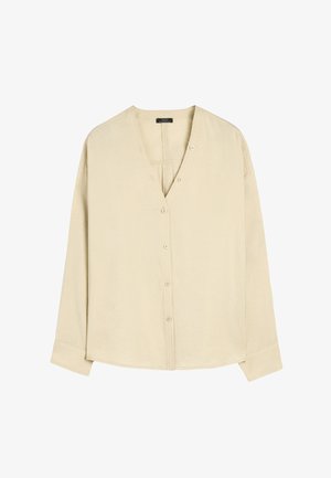 Jasnobeżowa koszula z długim rękawem, z dekoltem w serek, z pięcioma guzikami z przodu i luźnym krojem. Miękka tkanina o subtelnej teksturze.